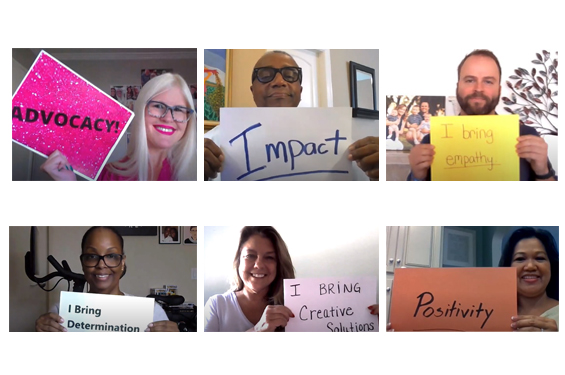 Employees holding signs of able inspiration