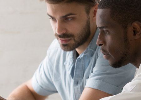 Man helping another man