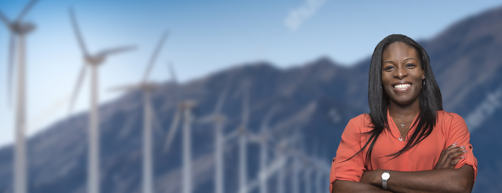 Lady crossing arms smiling