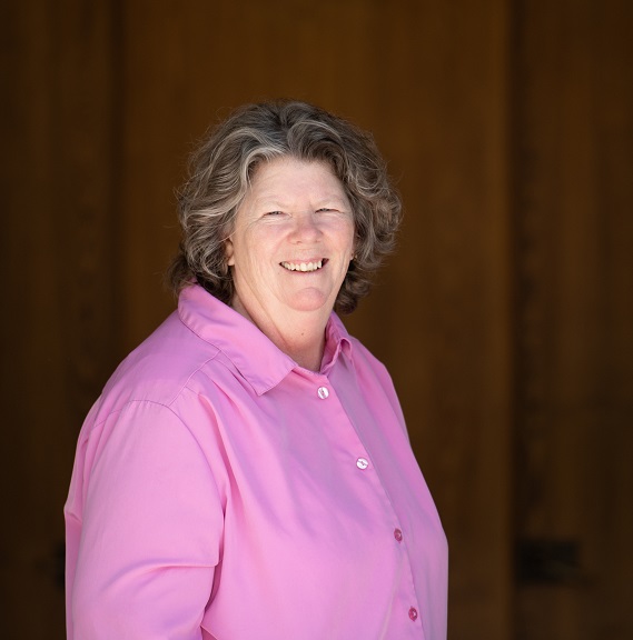 Women smiling in an embrace