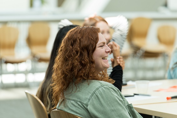 A young woman smiling