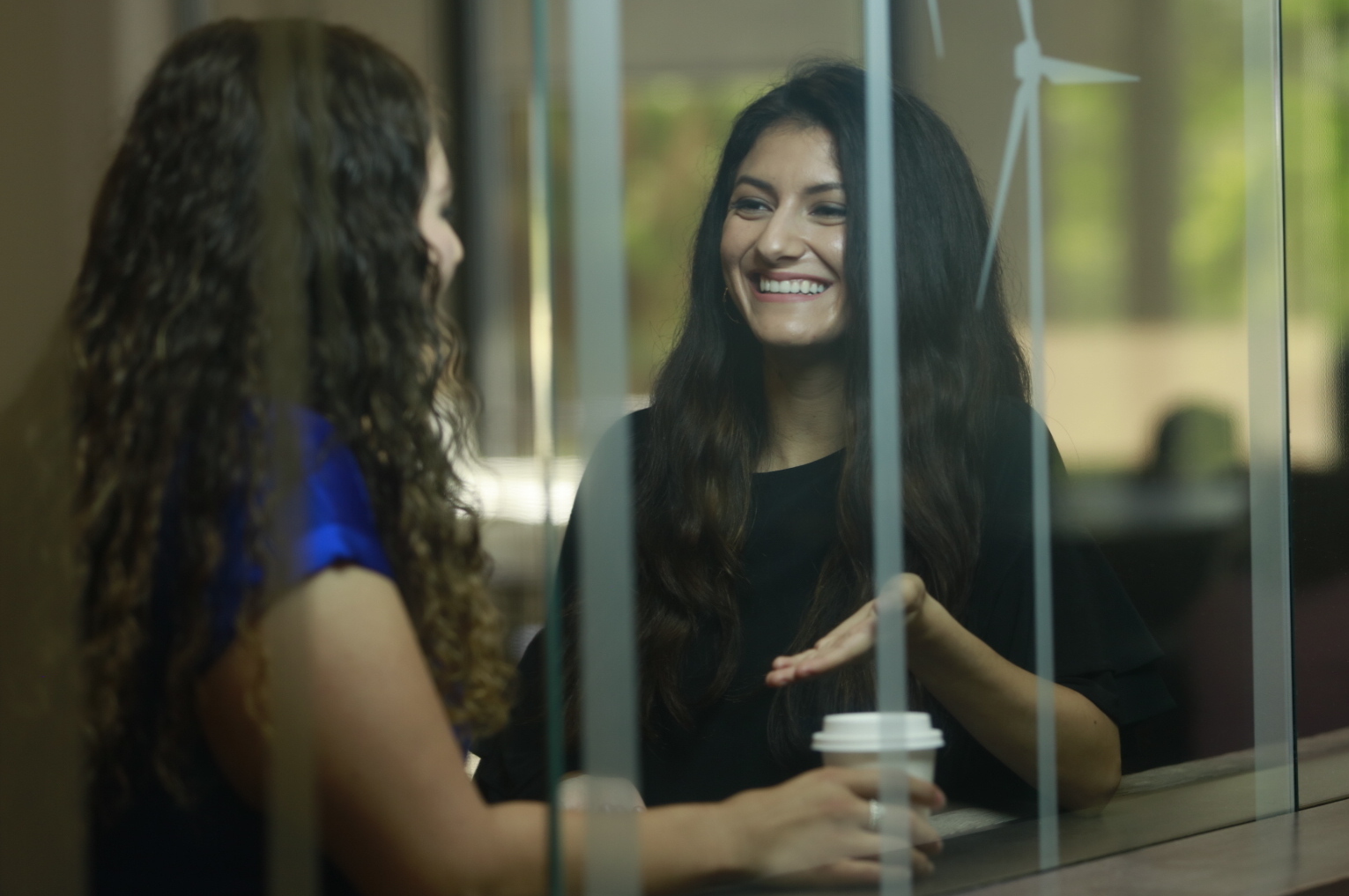 A woman giving advice to another woman