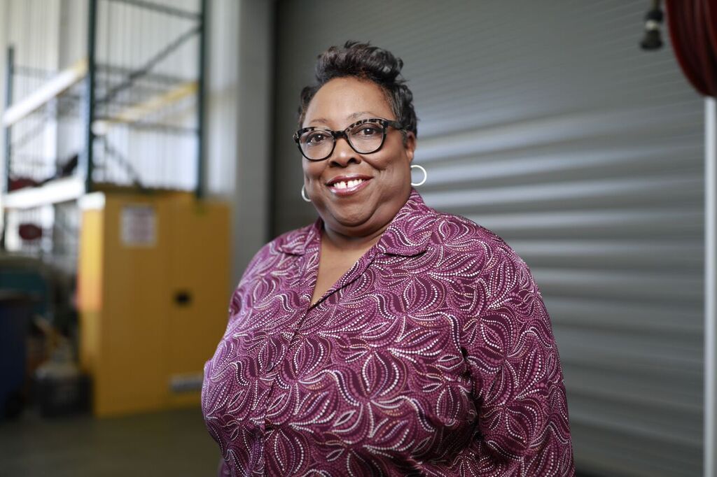 A woman smiling at the camera