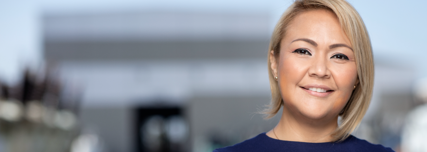 A woman smiling at the camera