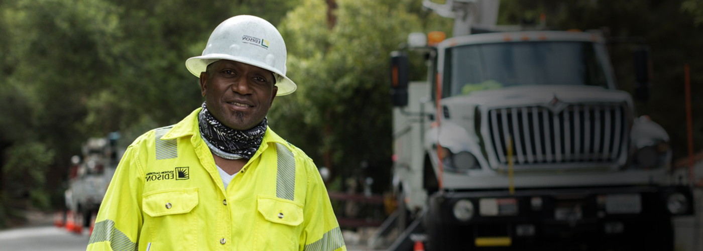Shot of a lineman worker at work in an open street environment