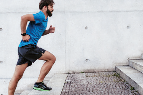 A man running up steps